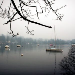 Fine art print of boats on a misty Lake Windermere in the Lake District